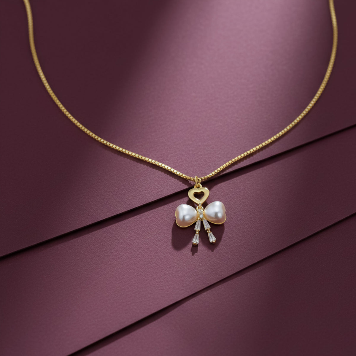 Elegant Gold Heart & Pearl Bow Necklace jewellery product view 1